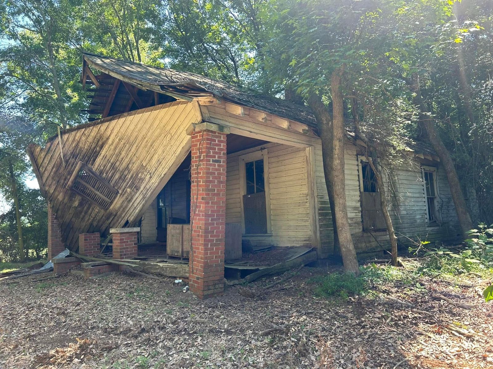 Collapsed old farmhouse before demolition and removal