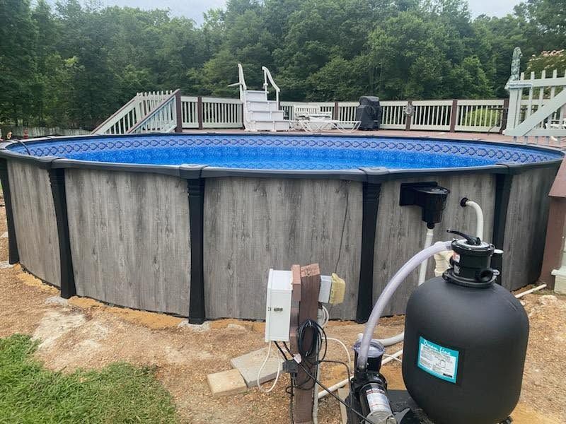 After: pool assembled, leveled, and plumbed